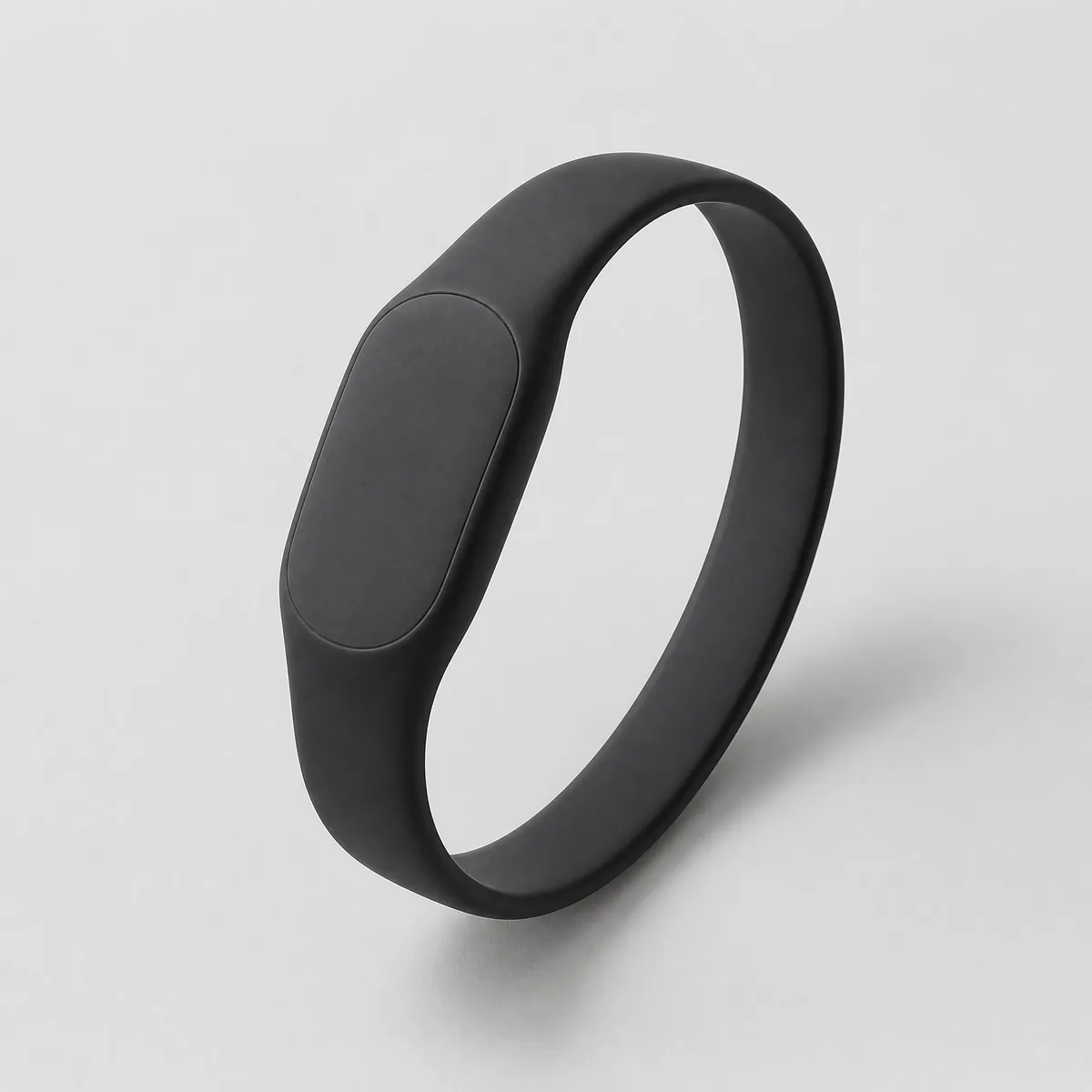 A plain black silicone tap wristband